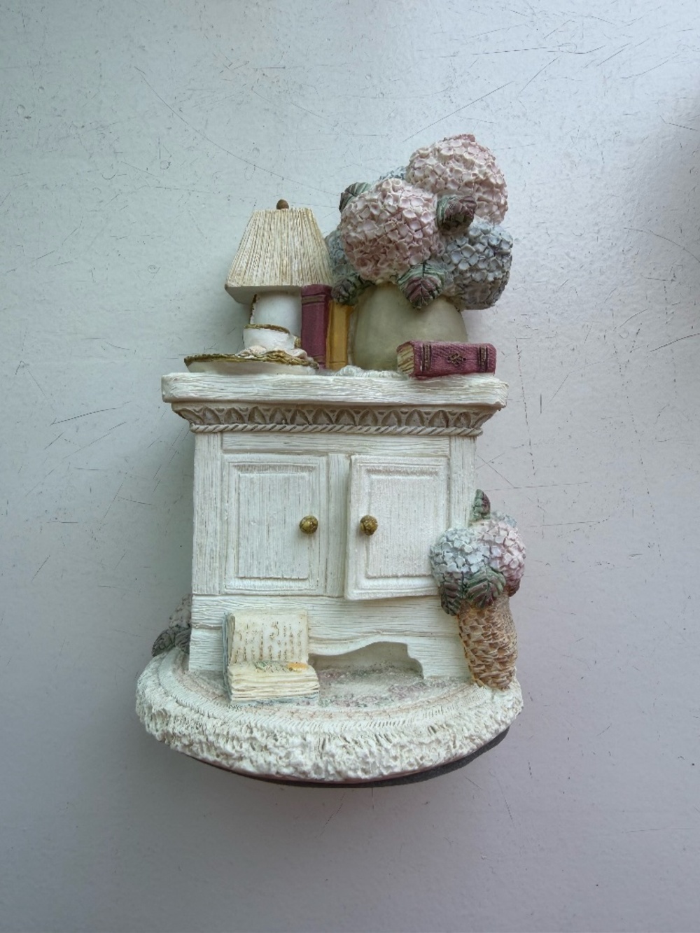 Bookends in a set of three with a charm box
